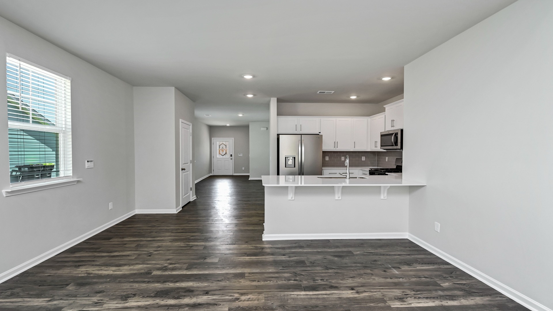 RevWood floors finish the main living areas and kitchen