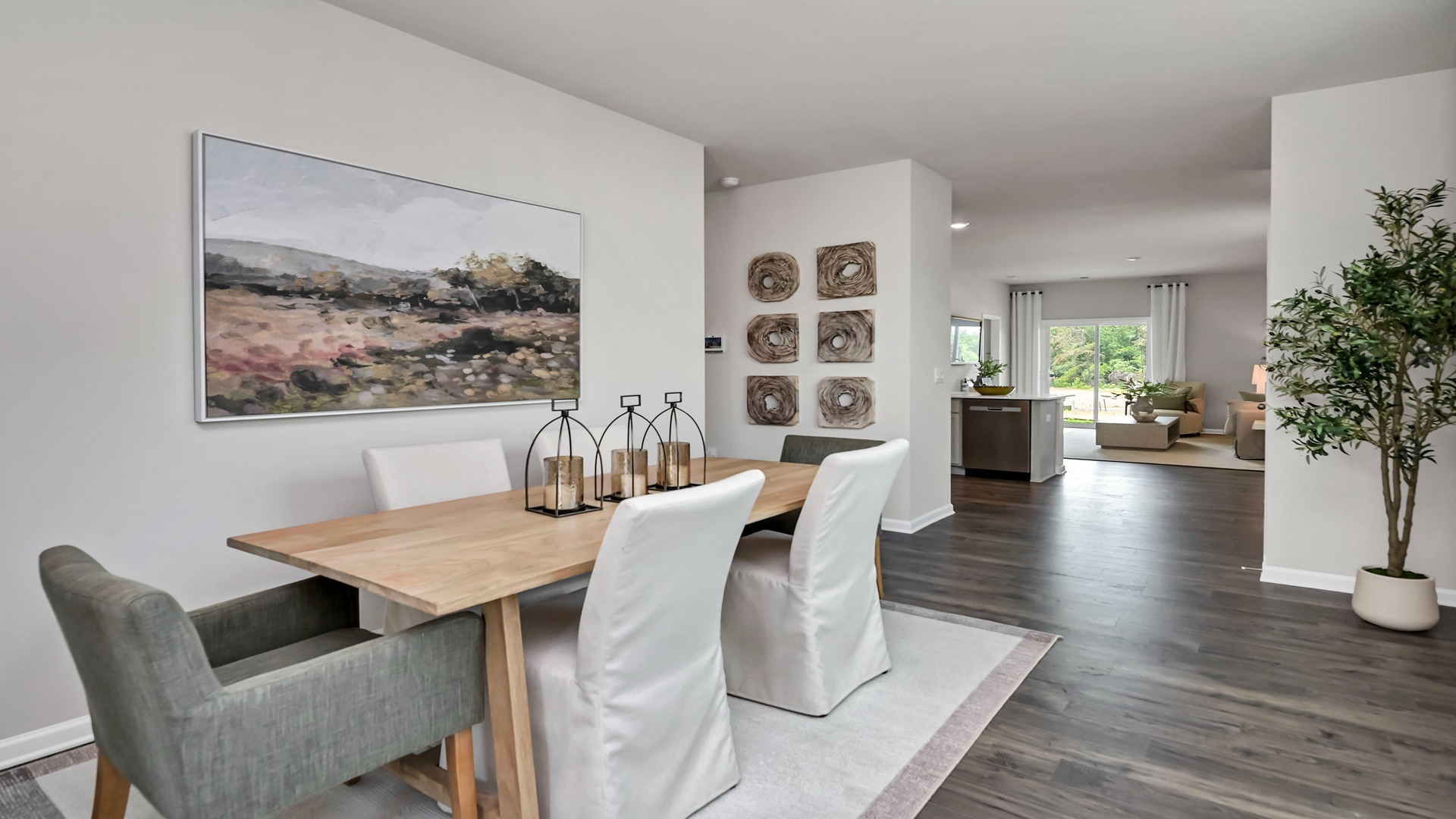 Dining area in new construction home with RevWood flooring
