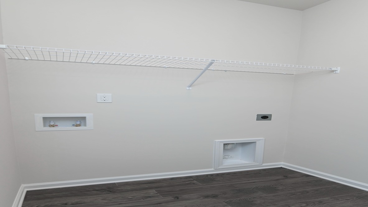 Centrally located laundry room with wire shelving