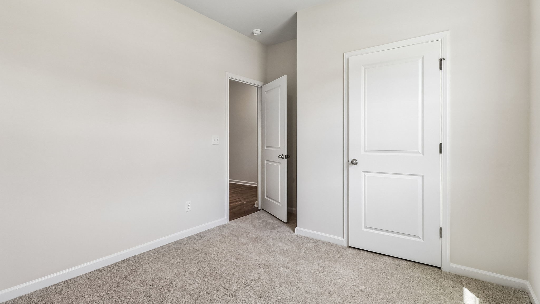 Bedroom 2 in the Kerry with a private closet and a window for light