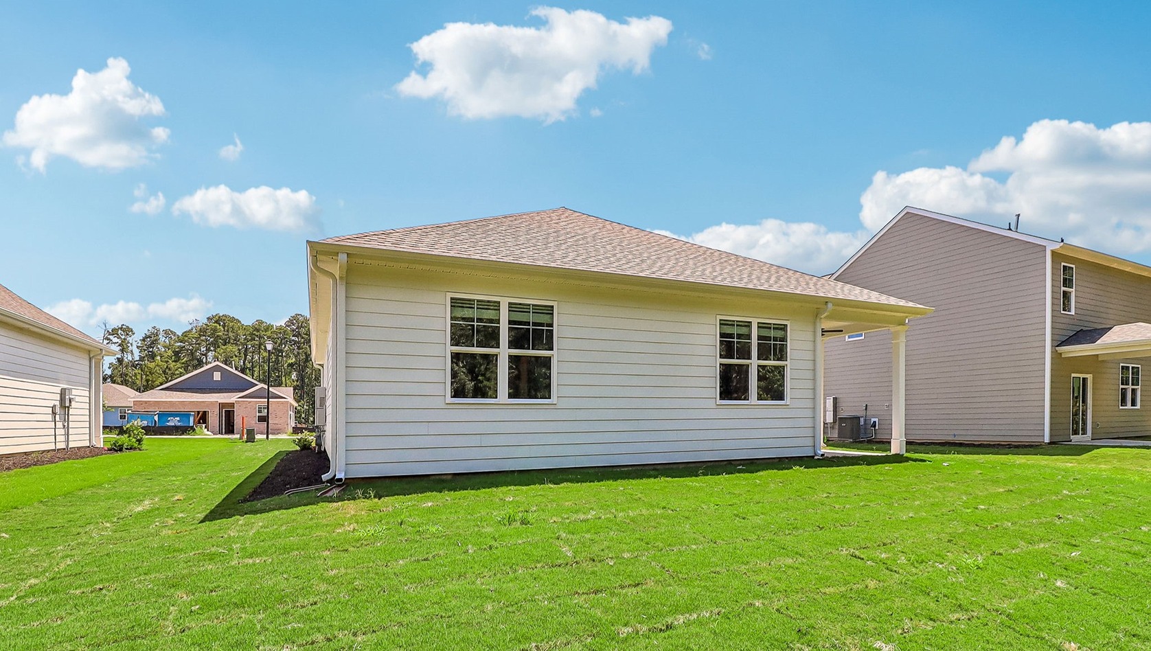 Back exterior of the home with Hardie Plank siding