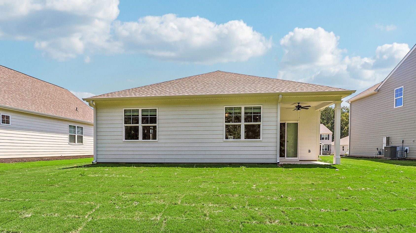 Covered back patio at the back of the Kerry floorplan for sale in Sease's Pond