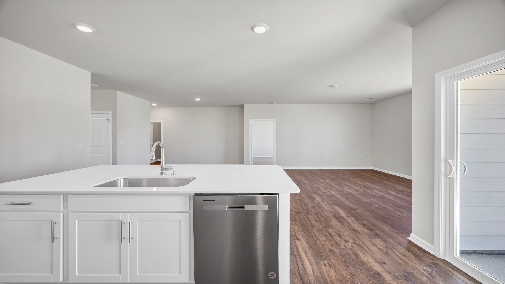 Dishwasher and kitchen sink on center floating island
