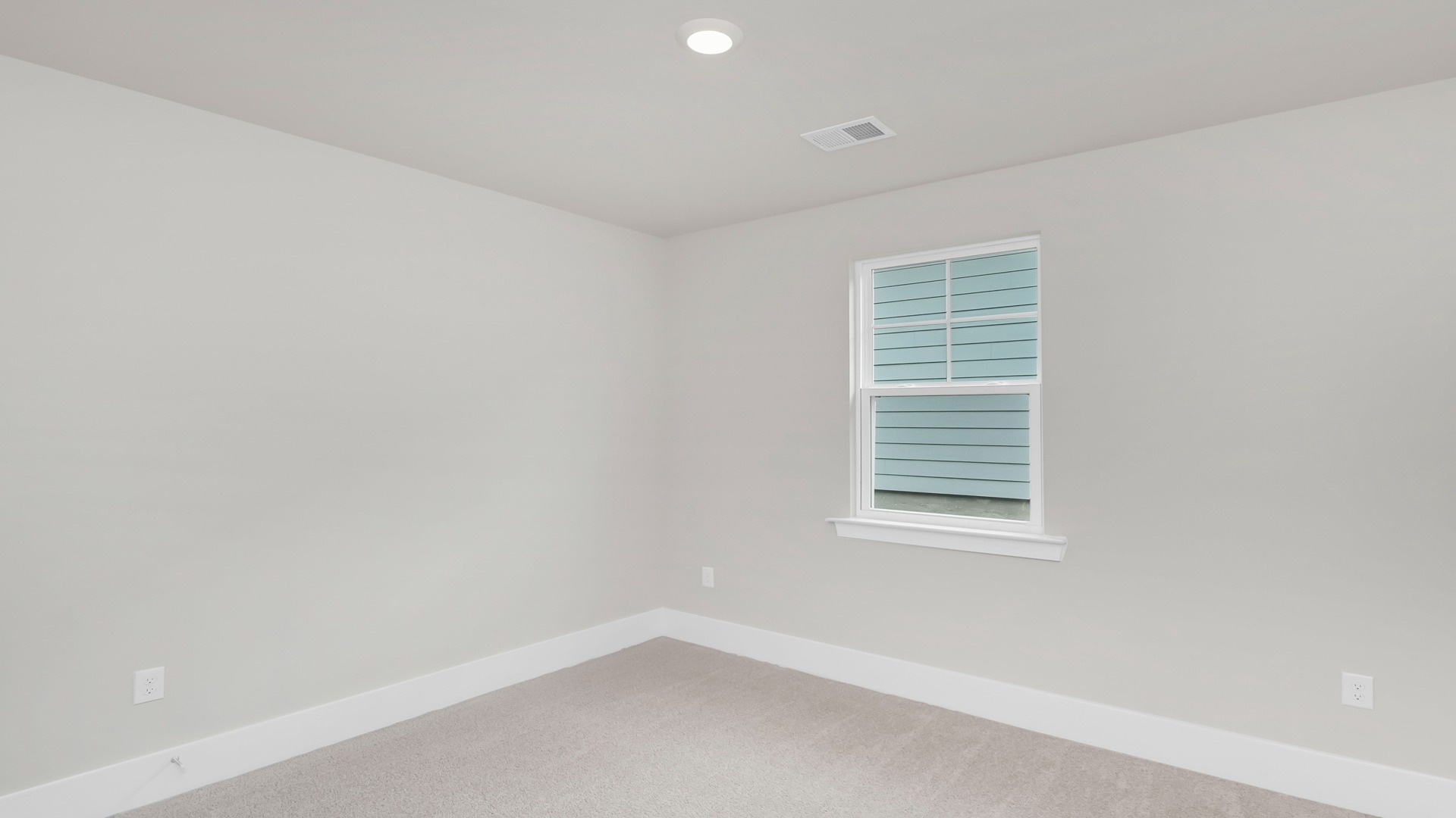 Bedroom 3 with carpet flooring and a closet