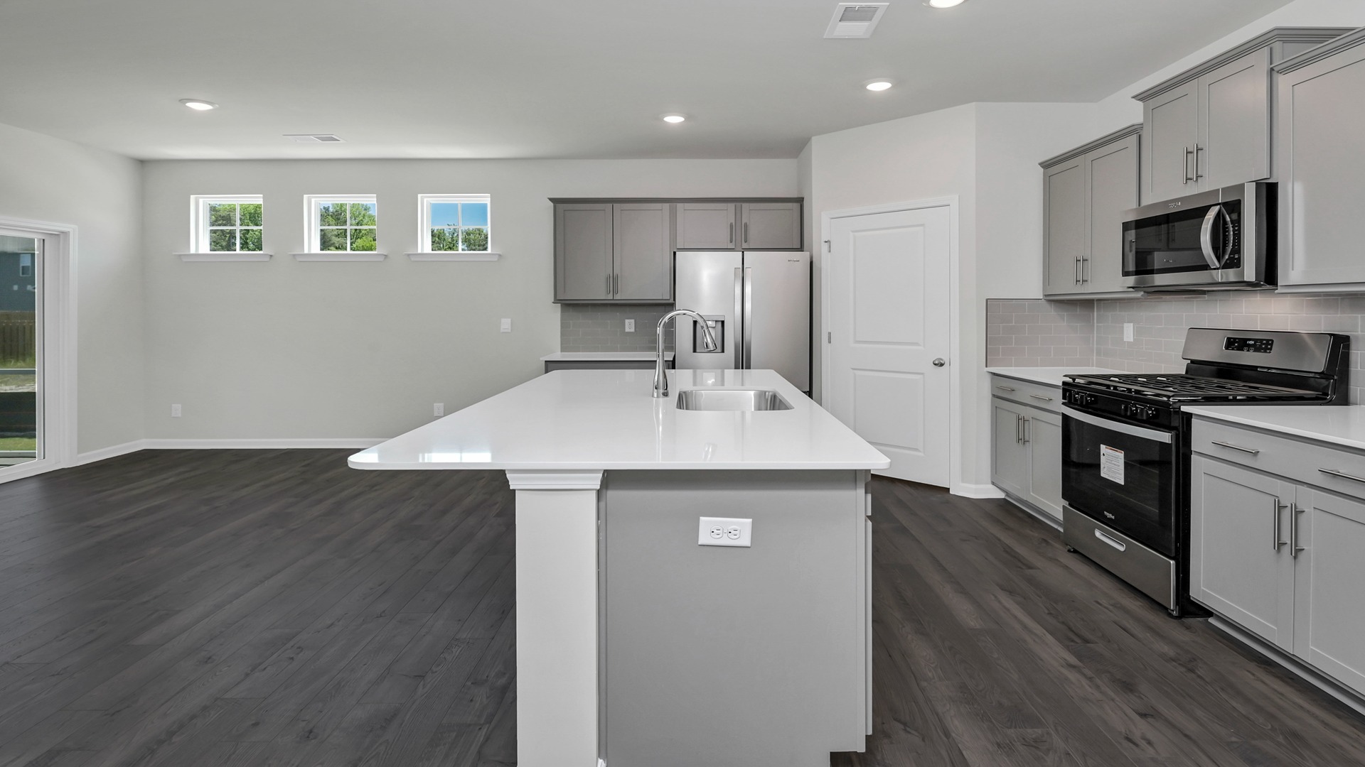 Floating kitchen island with space for barstool seating