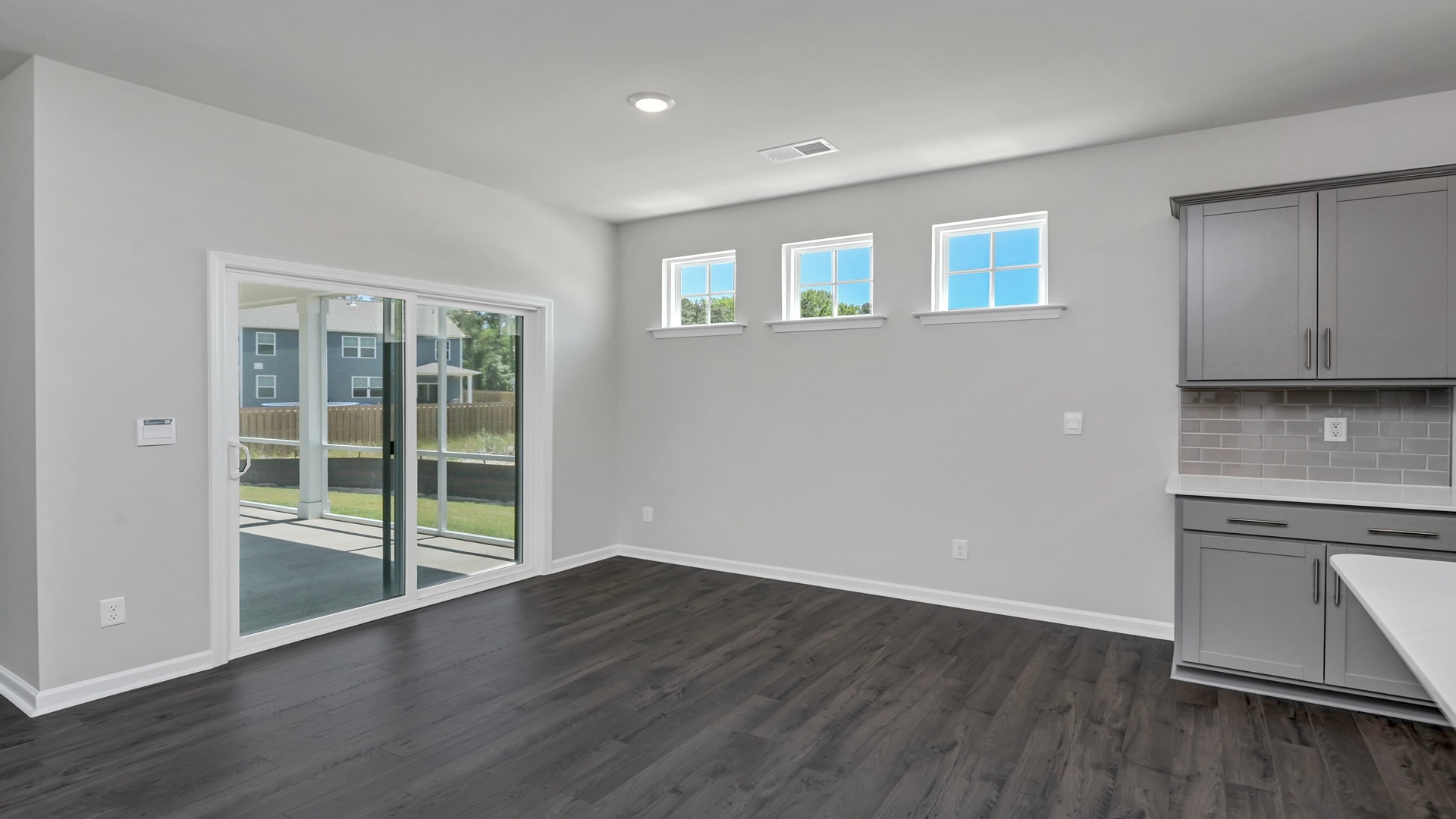 Dining area with access to back patio through glass sliding doors