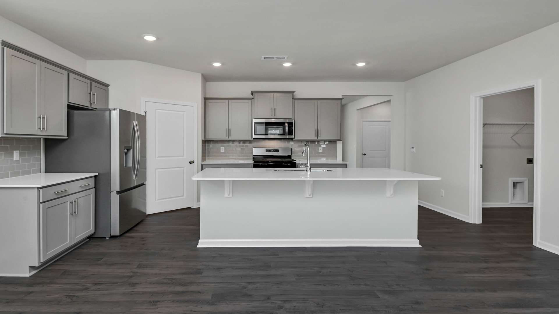 Large kitchen with center island in home for sale in Gilbert, SC at 177 Ruby Prince Road