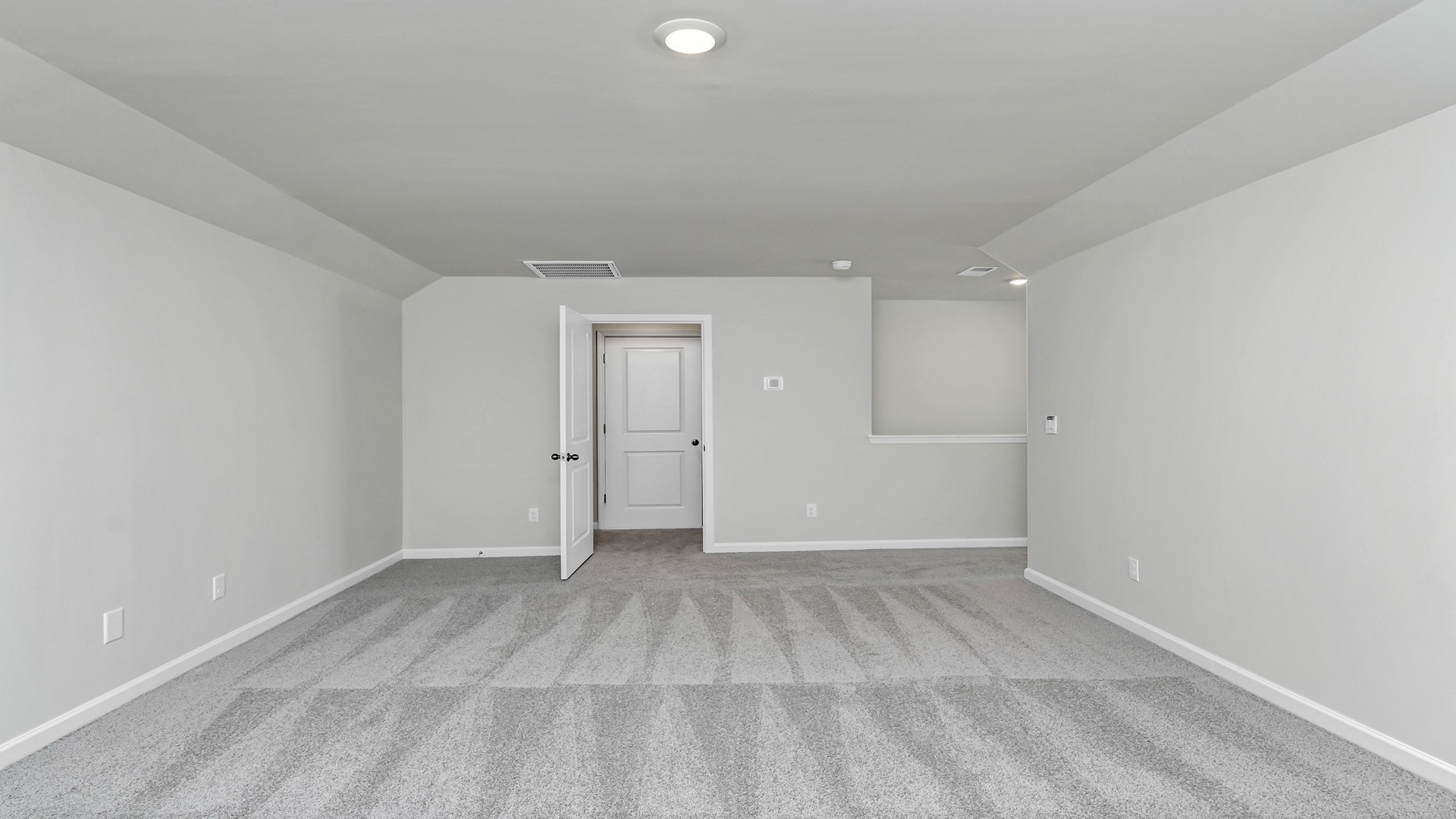 Upstairs loft space that could be used as game room or secondary living space