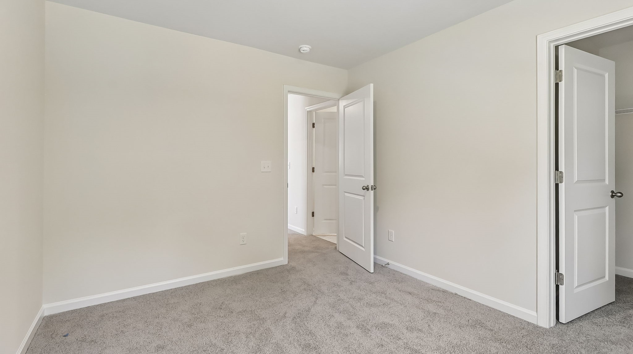 Walk-in closet in bedroom 4 of the Aisle floor plan