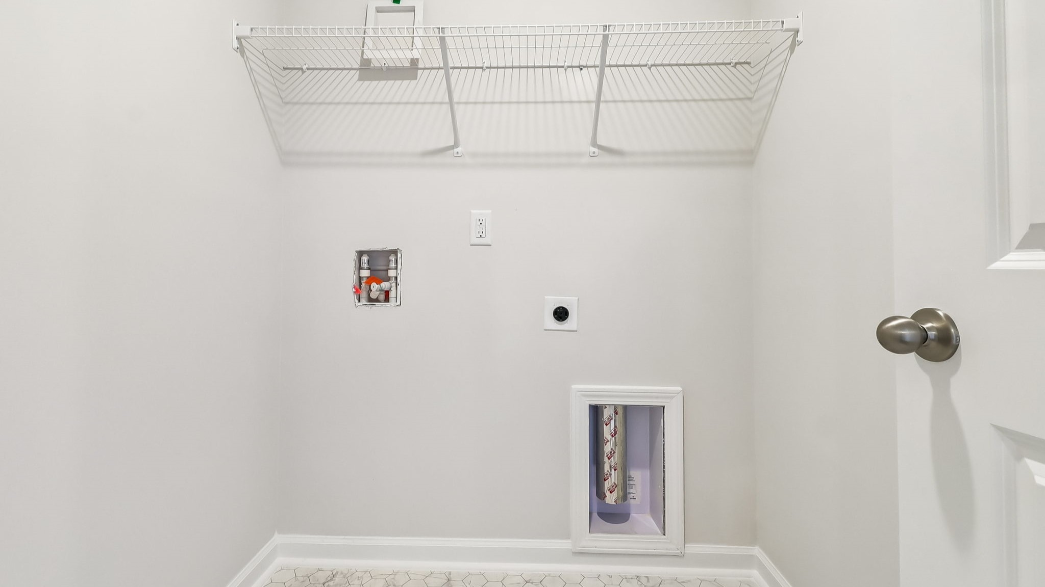 Laundry room upstairs with all bedrooms in the Aisle