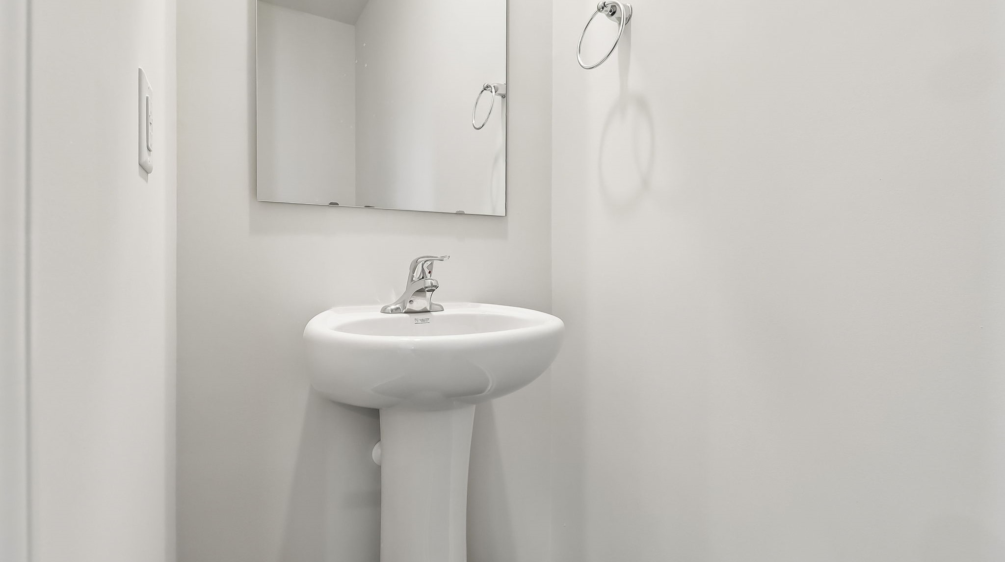 First-floor powder room in the Aisle floor plan for sale in Sease's Pond in Gilbert, SC