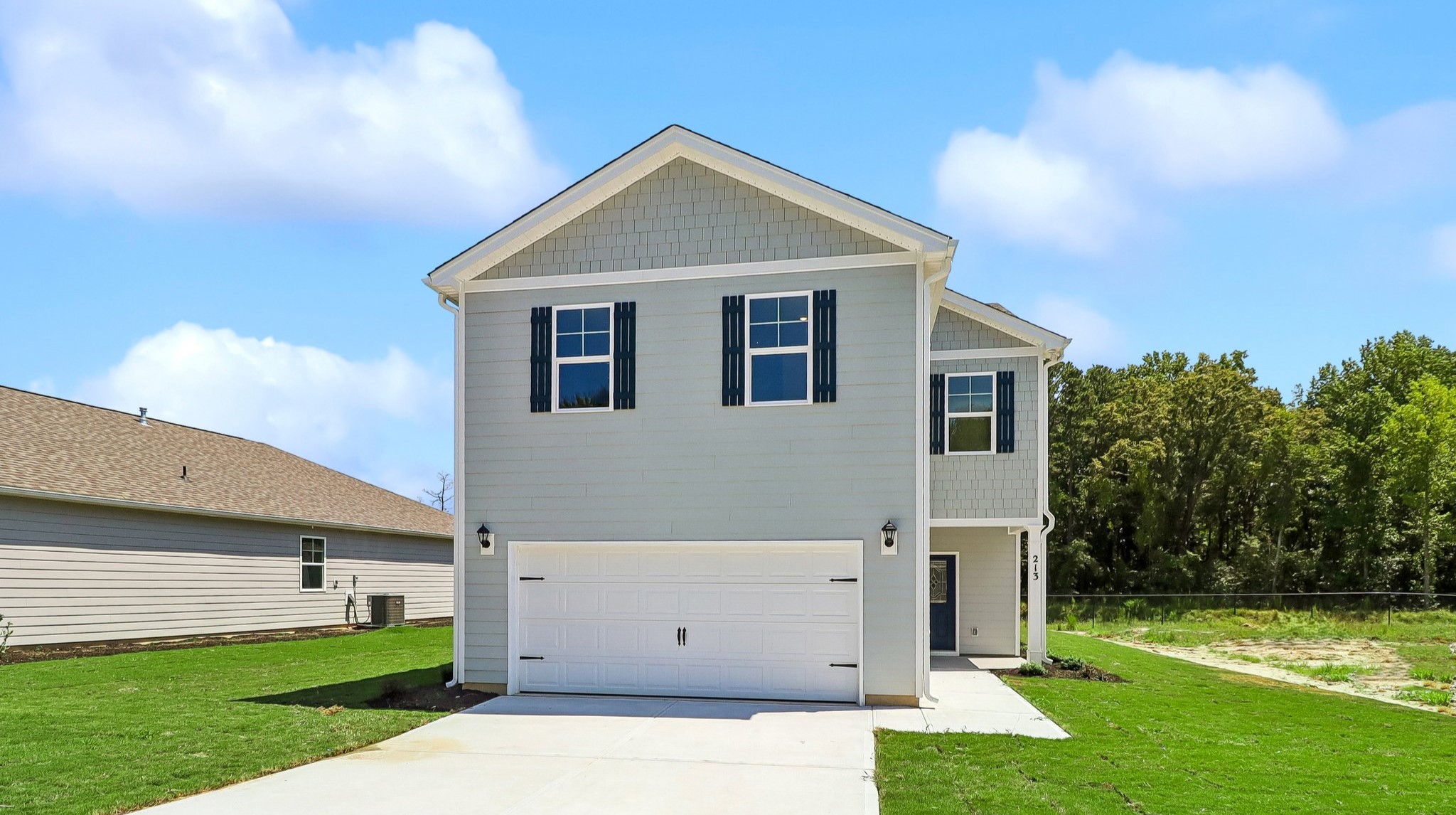 Two-story home for sale in Sease's Pond with a 2-car garage and Hardie plank siding