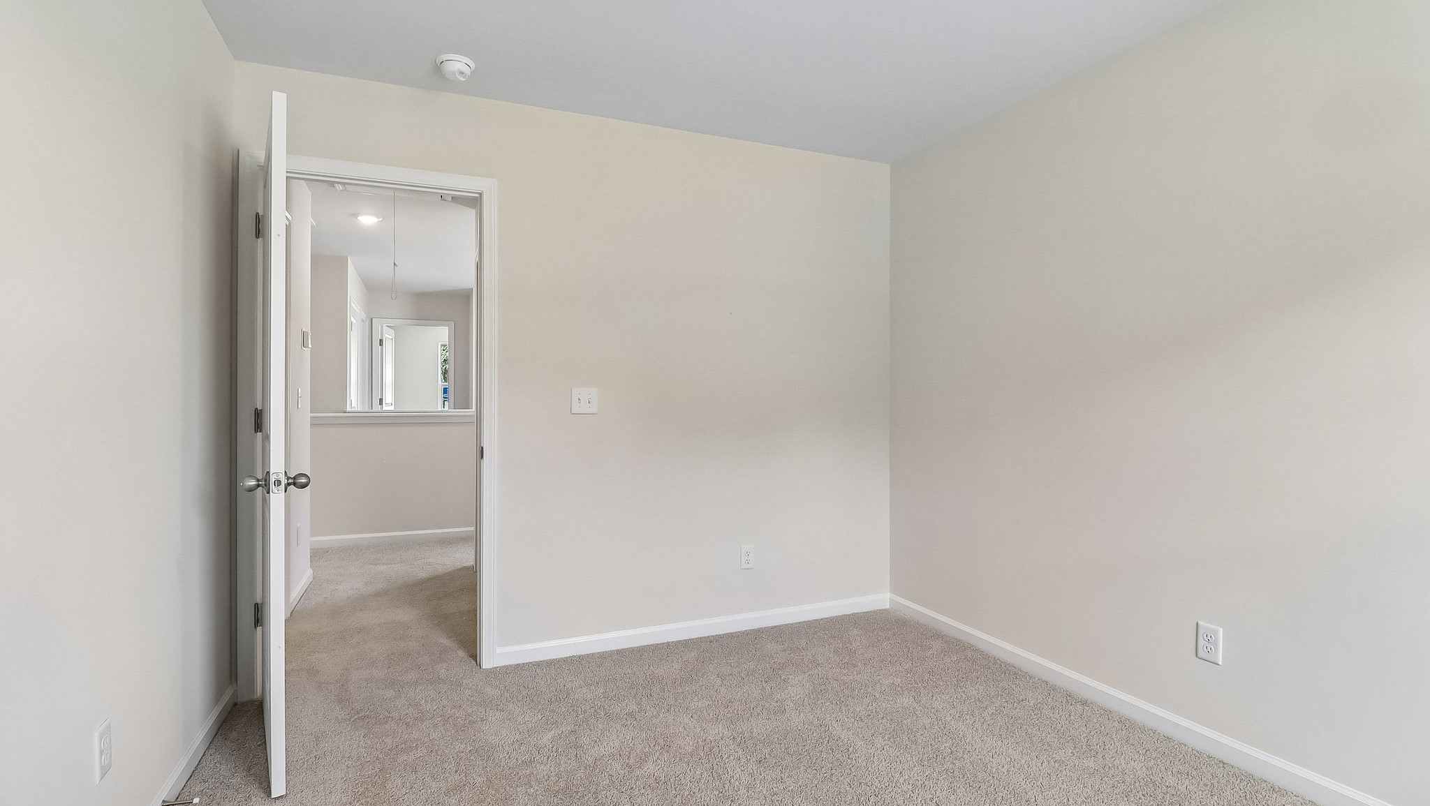 Neutral painted walls in bedrooms of the Aisle floorplan