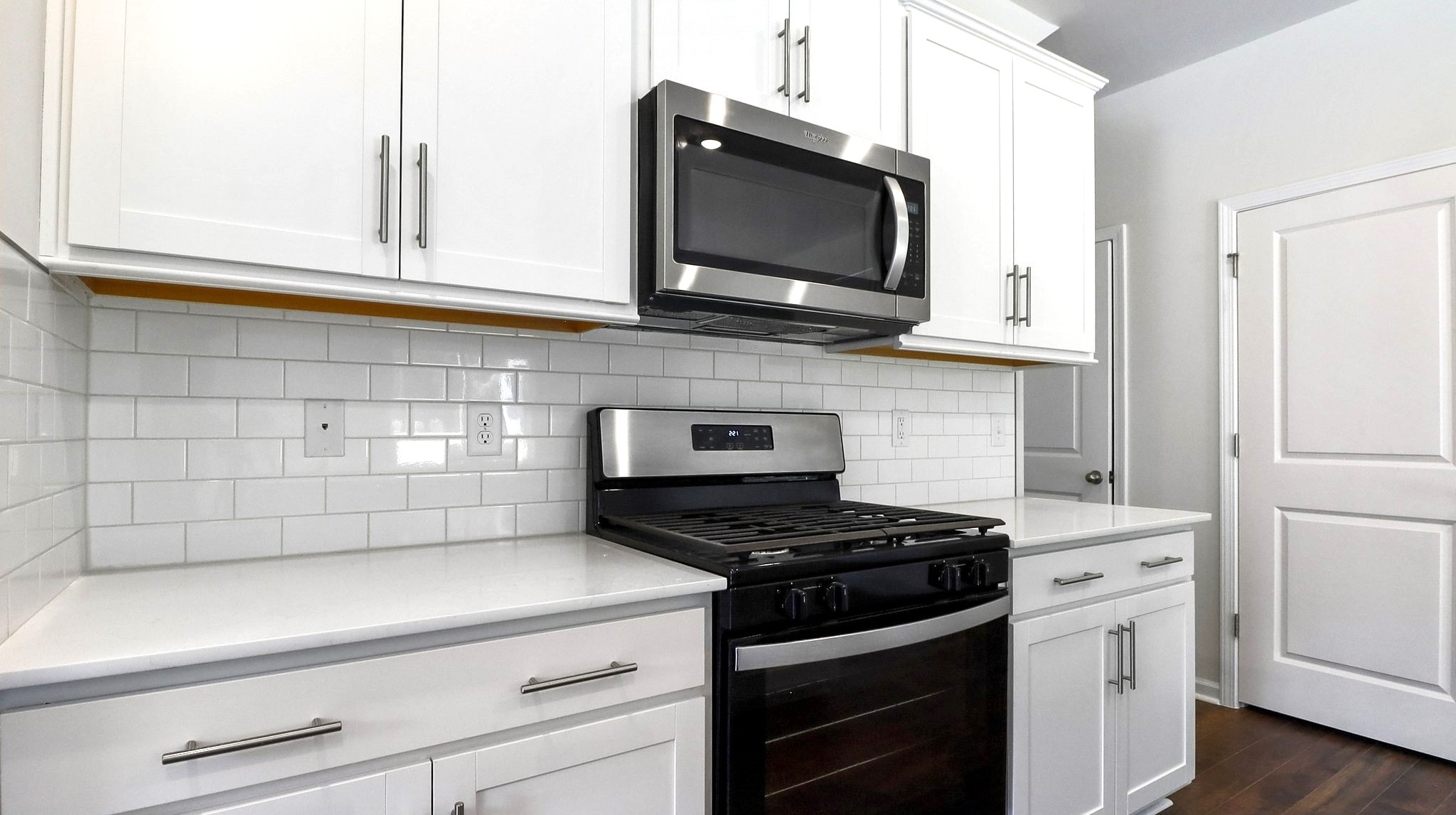 Tile backsplash finishes the kitchen of new construction home for sale in Gilbert,