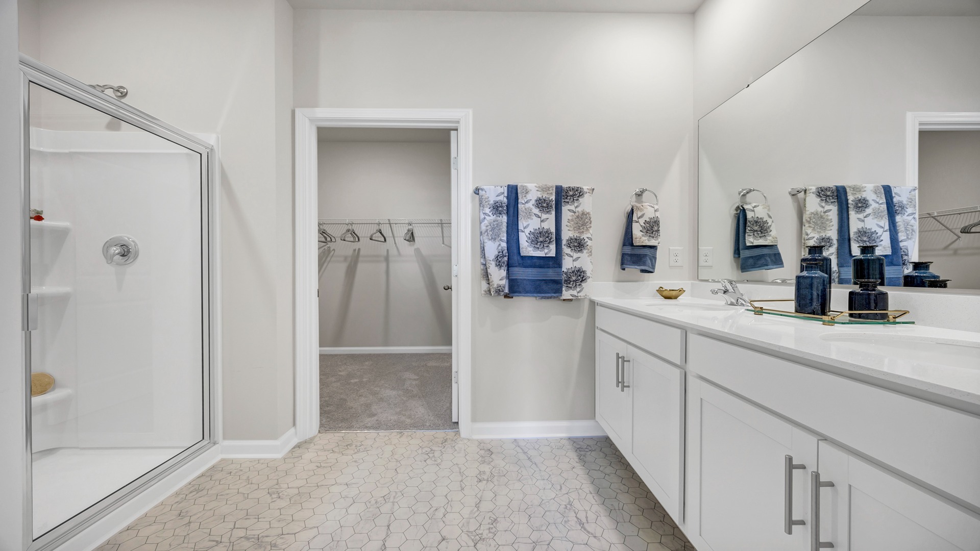 En-suite primary bathroom and closet of the Manning floorplan in Gilbert