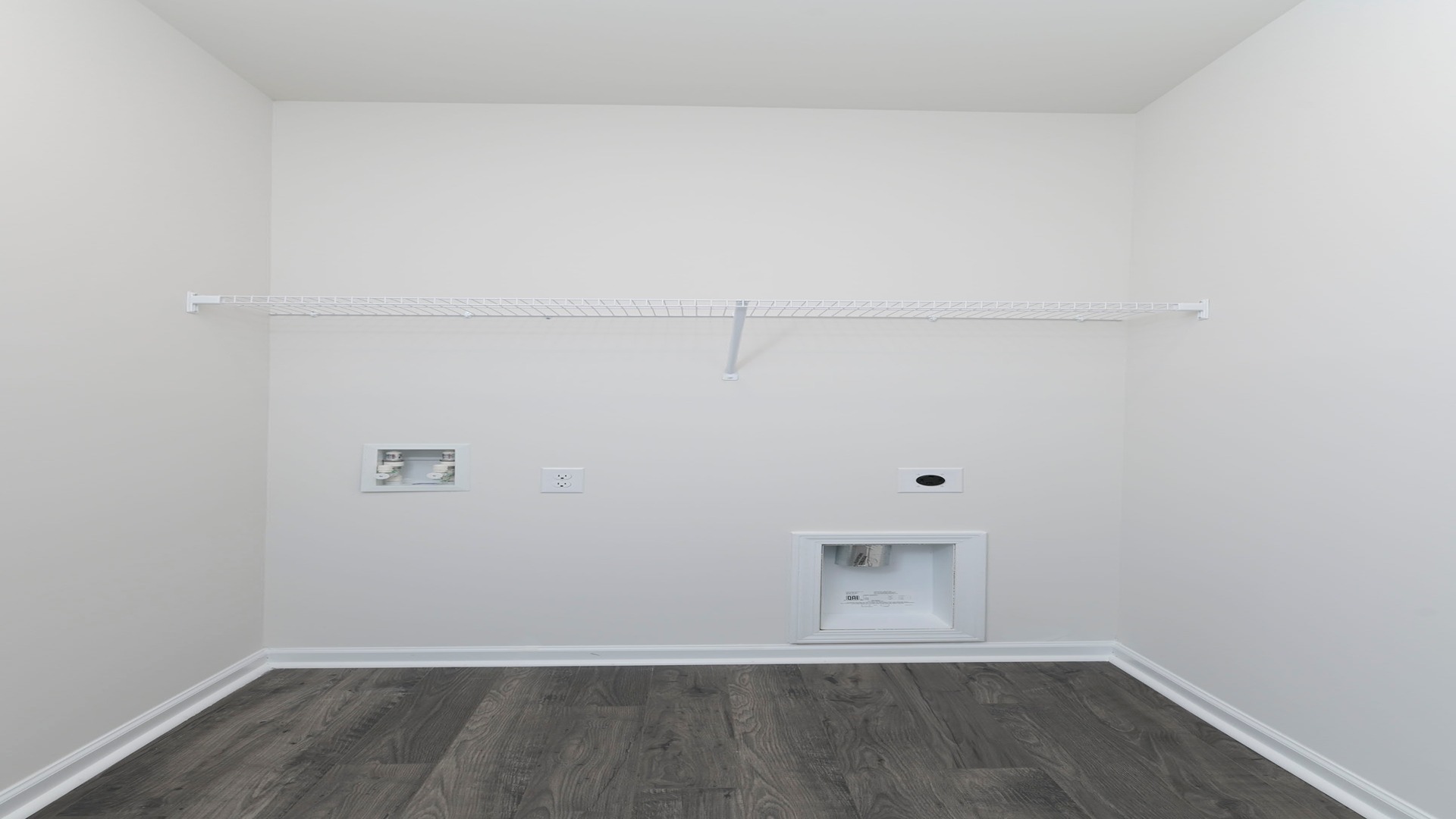 Downstairs Laundry Room with wire shelving above