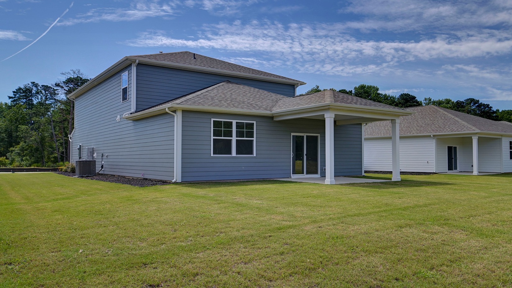 Hardie Plank exterior on the whole house and covered back patio
