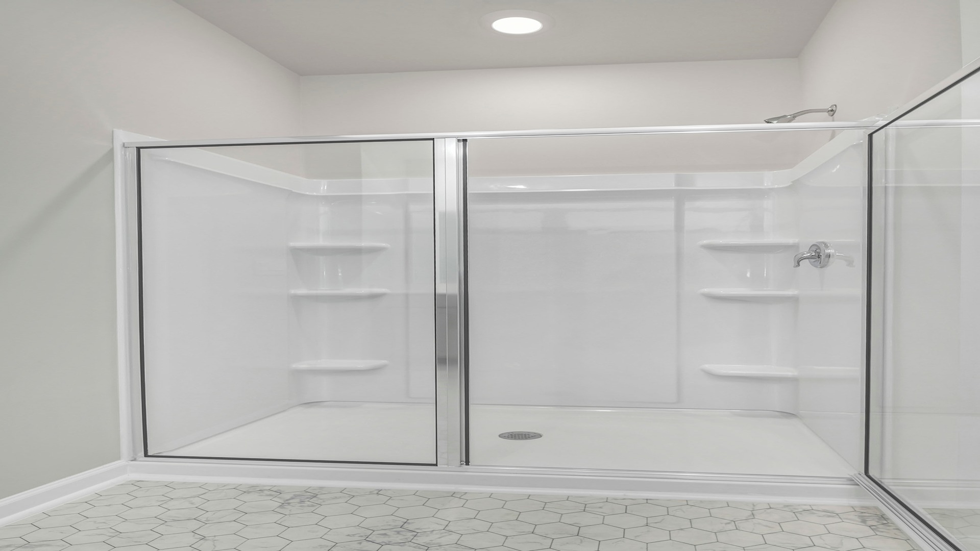 Standup primary shower with glass doors