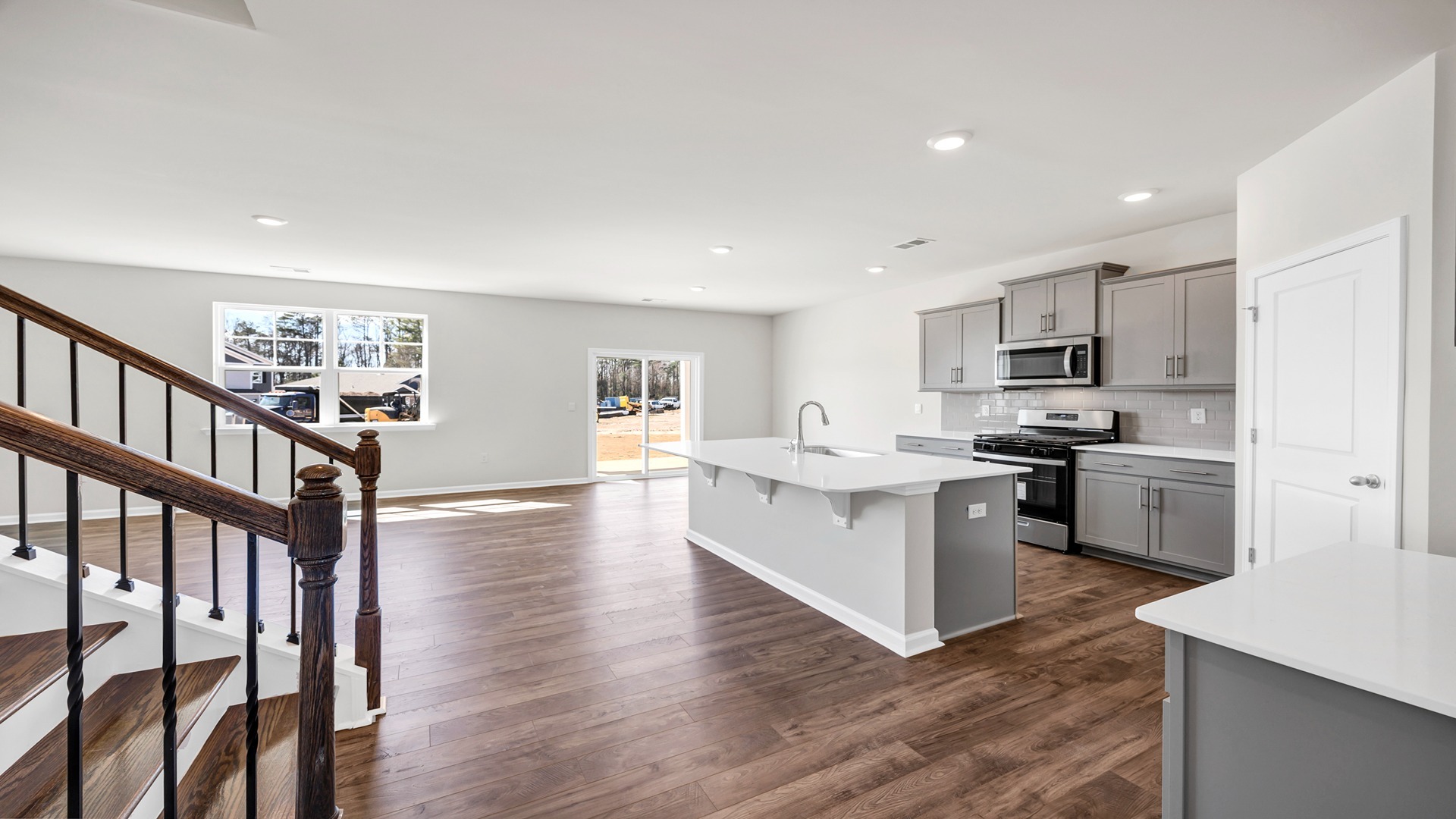 Front foyer opens up into main downstairs living areas and kitchen