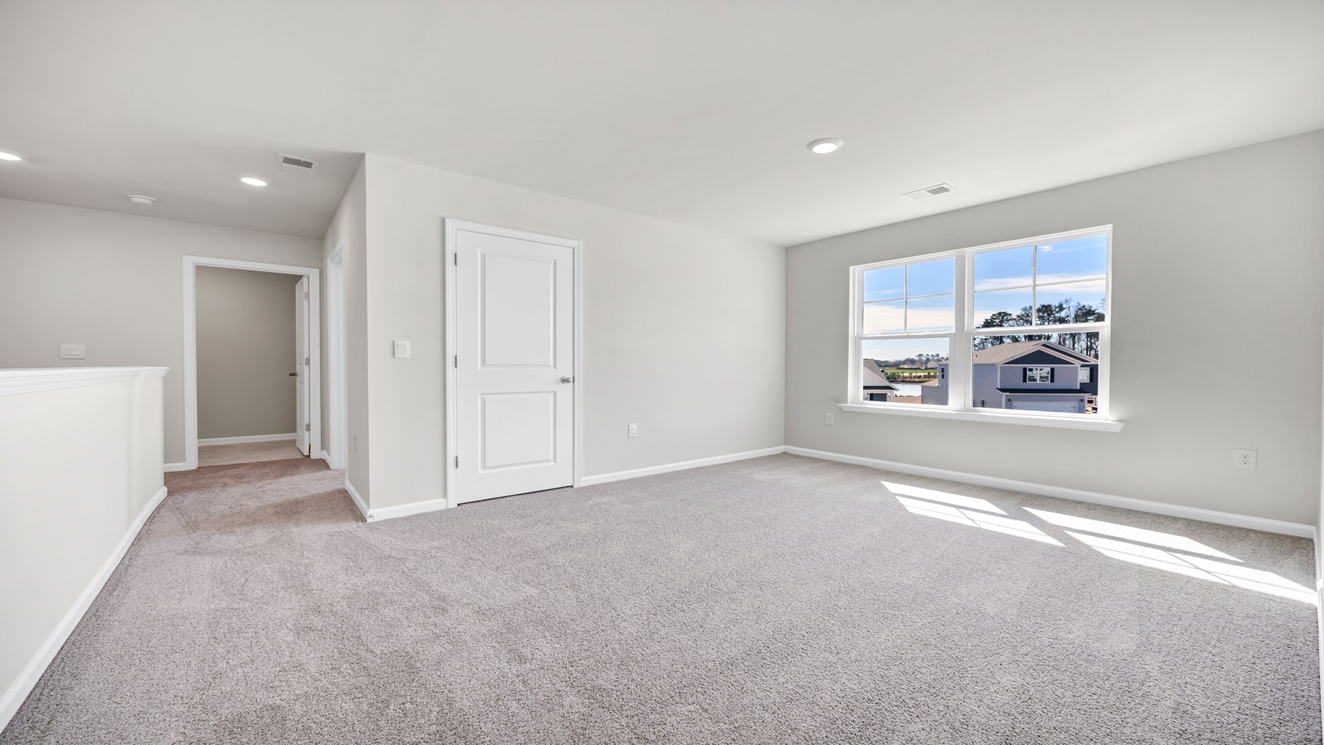 Upstairs living area features closet for extra storage