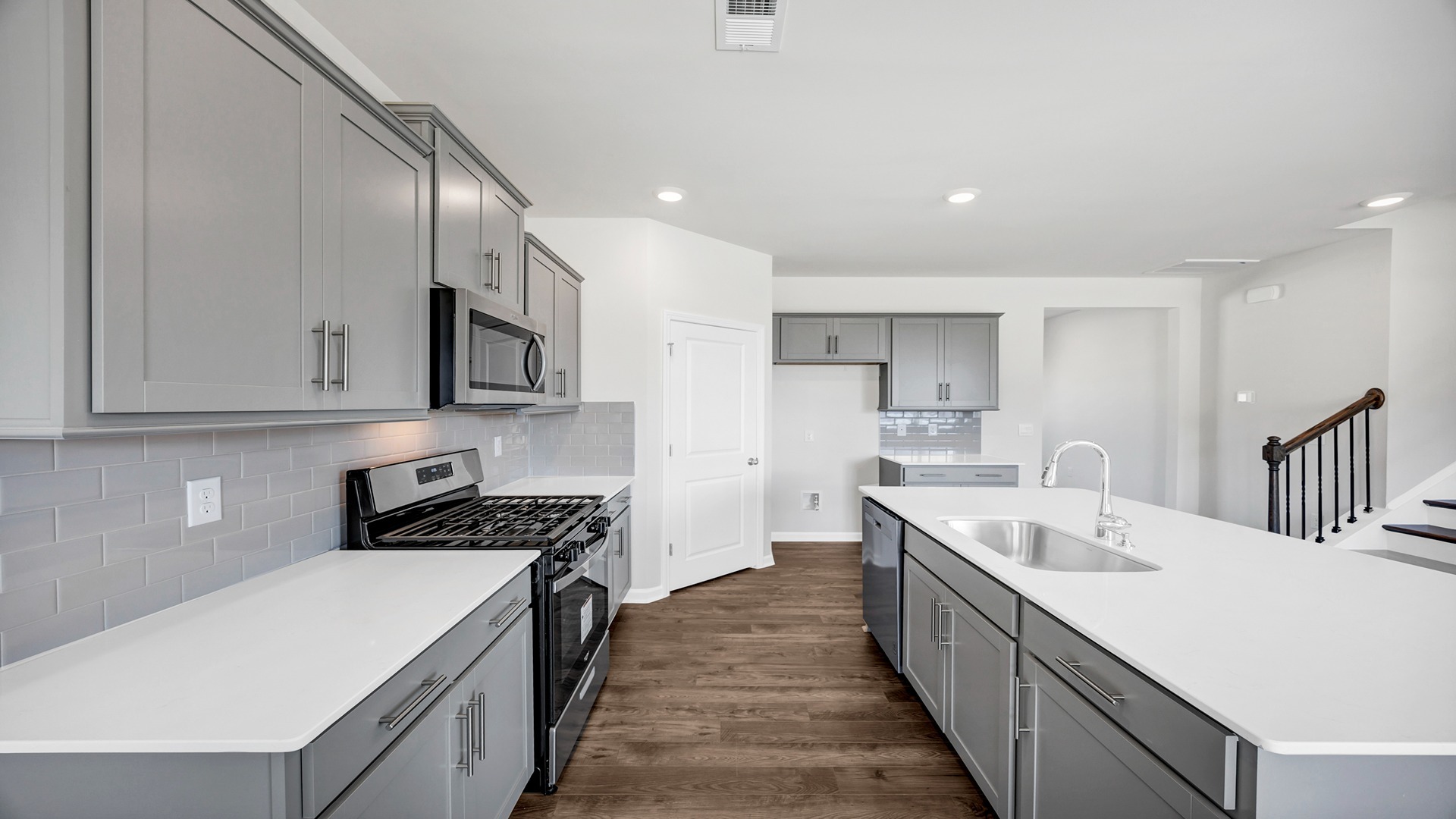 Kitchen features a spacious corner pantry