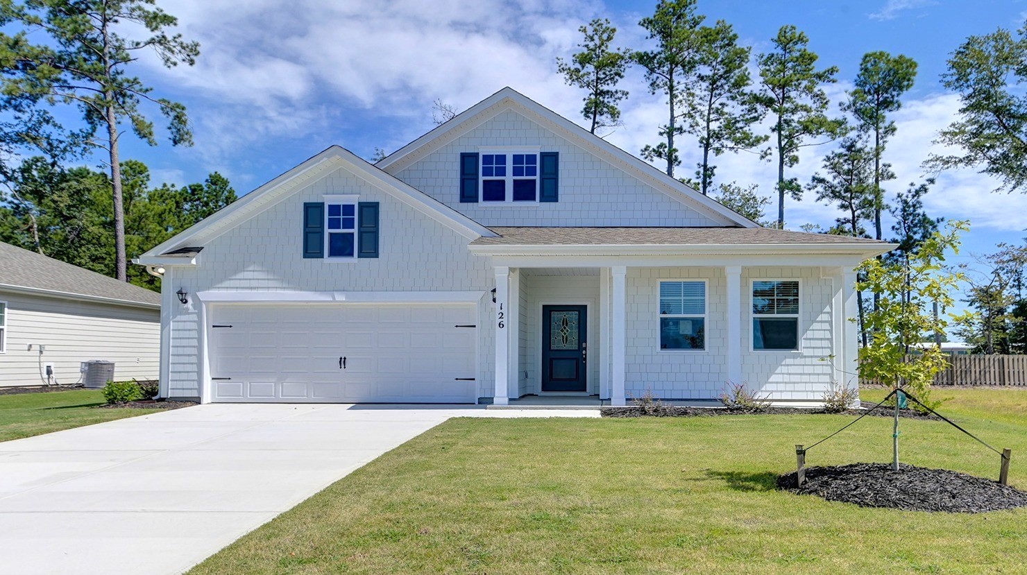 The Dover exterior with spacious yard