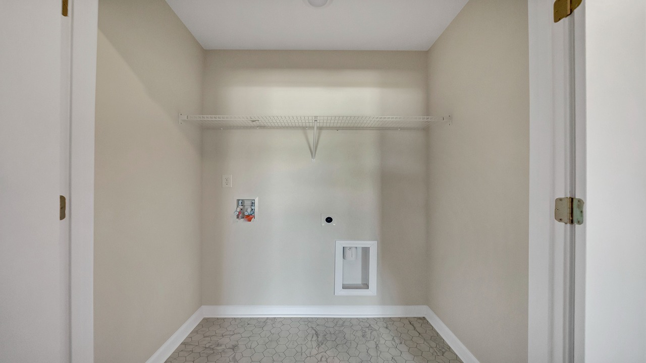 The laundry room is upstairs with all the bedrooms.