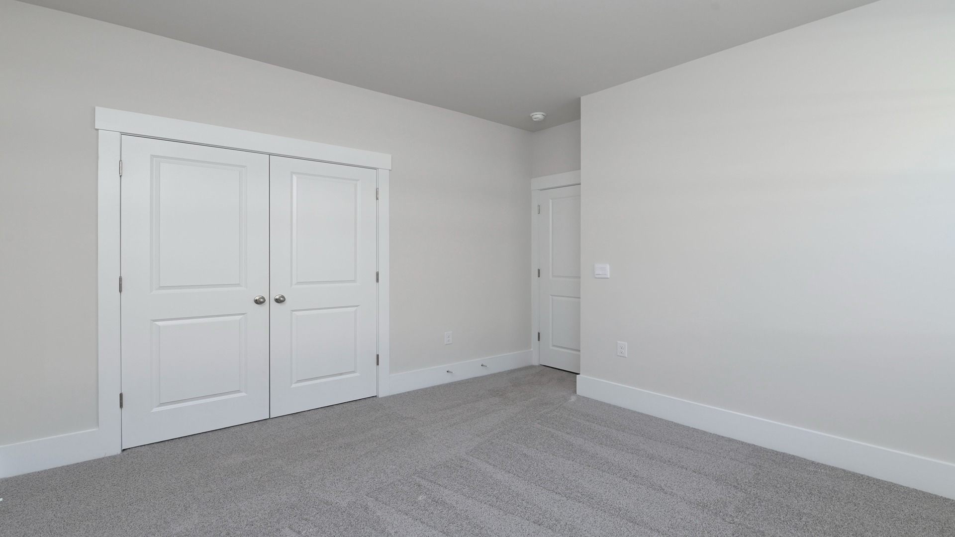 French closet doors in bedroom 3 of the Eaton