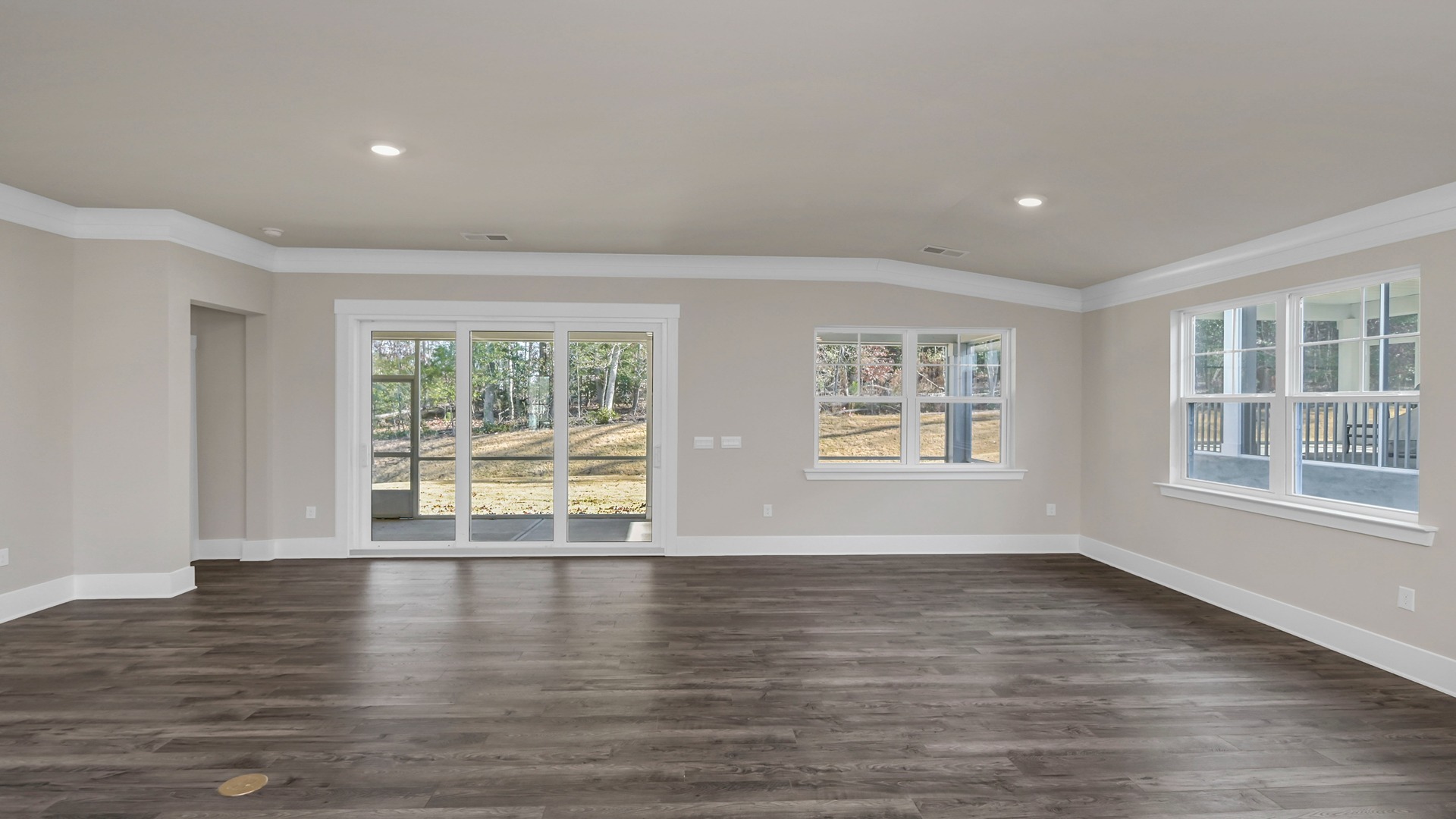 Open concept dining and living areas in new construction home for sale in Chapin, SC