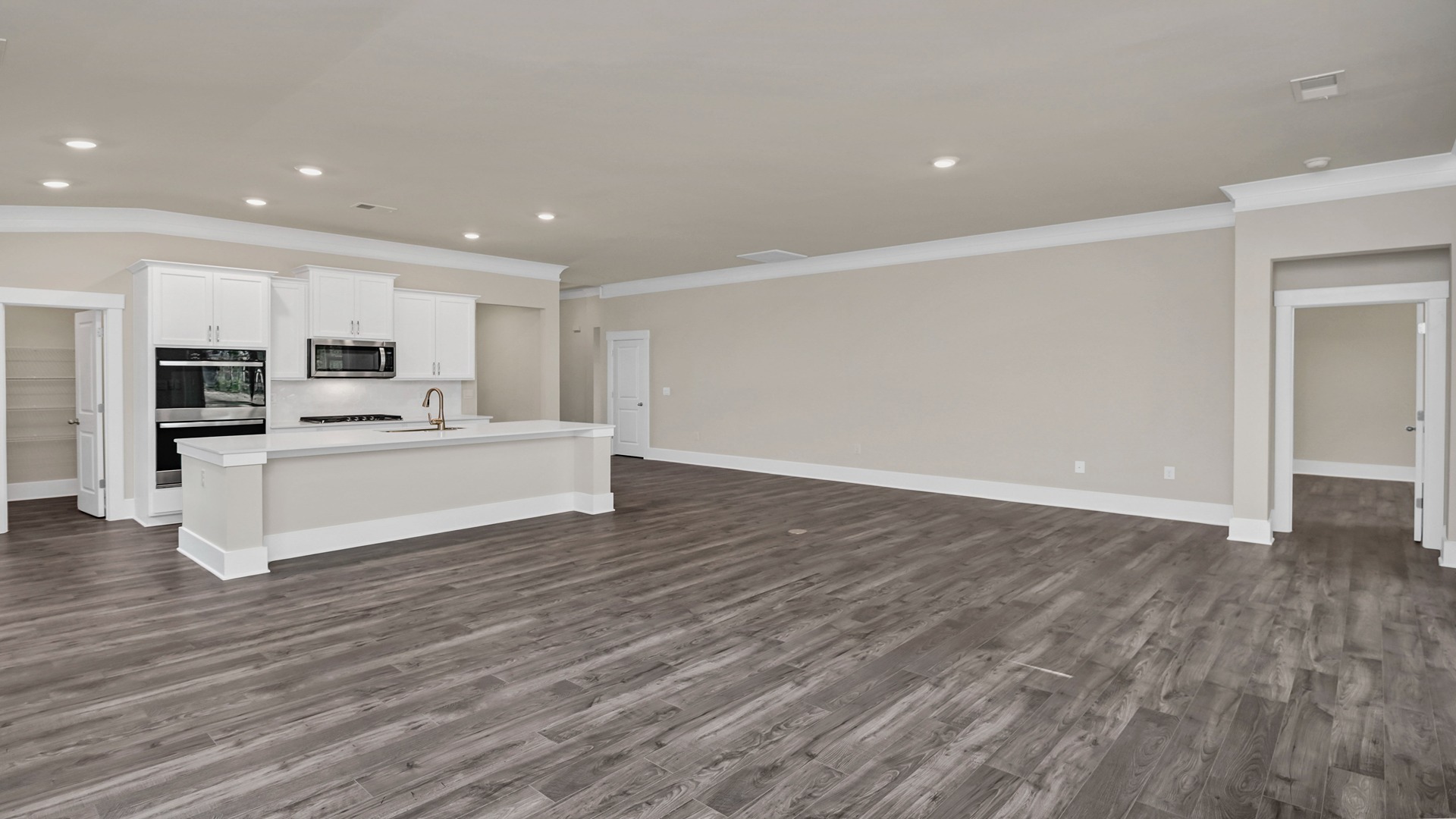 Access to primary suite at back of home/off the living area of the Eaton