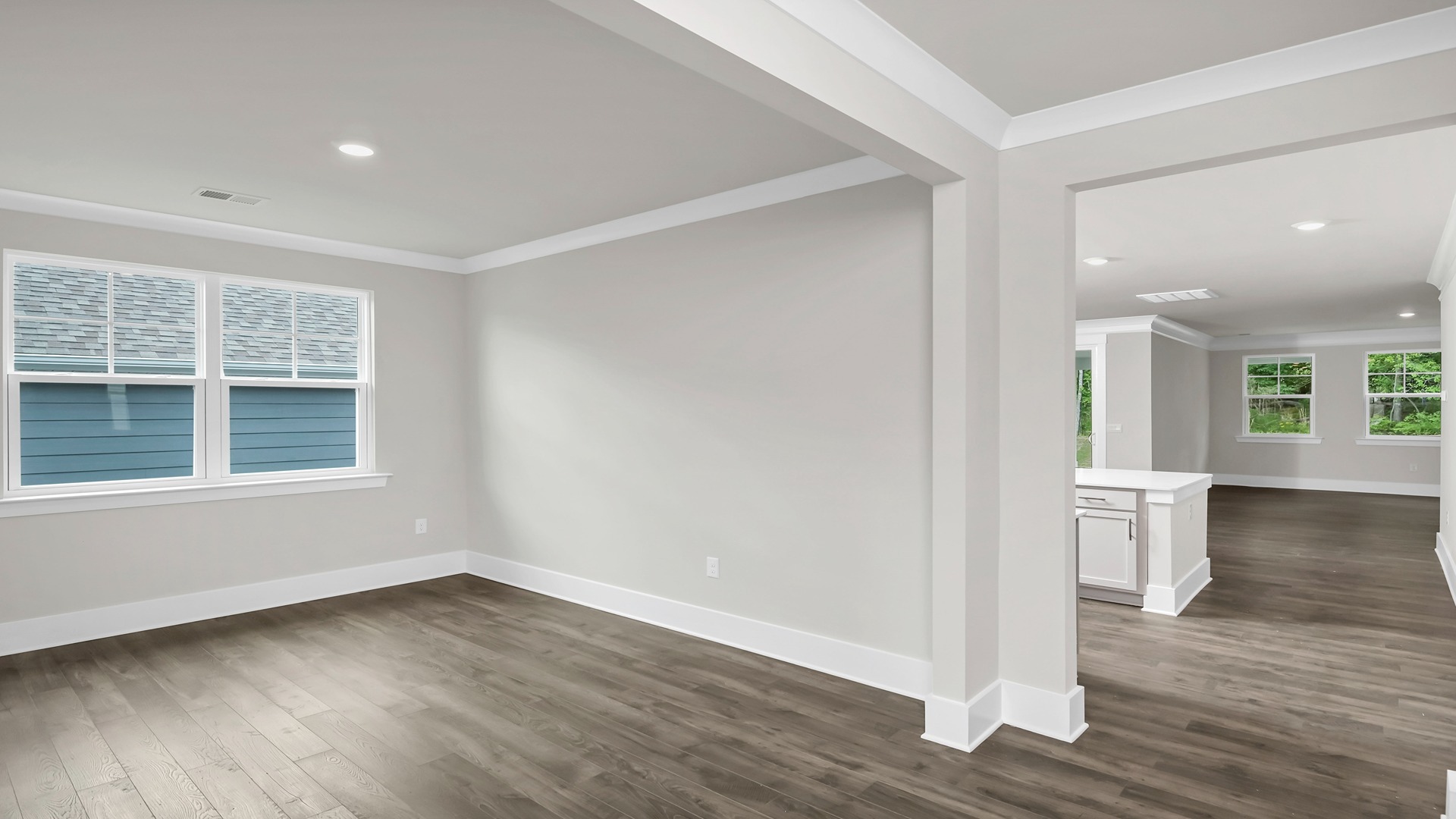 The front flex space could be used as a formal dining area or home office