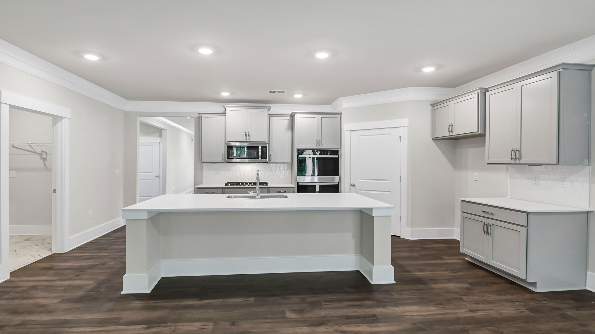 Gray cabinetry in kitchen of the Darby for sale in Chapin, SC