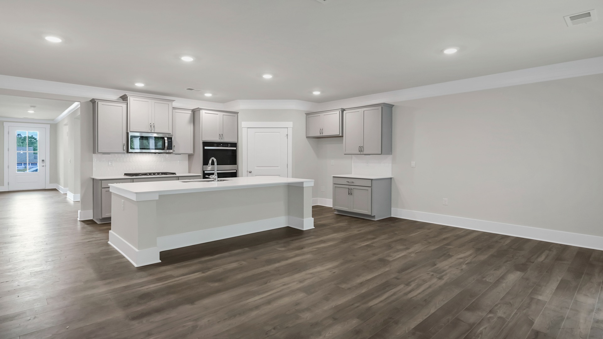 Kitchen area opens up off the front foyer
