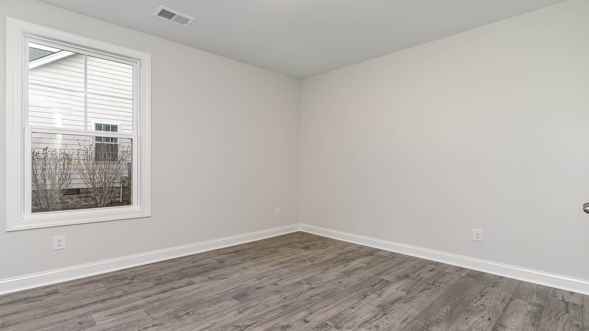 Bedroom 3 with a window for natural light