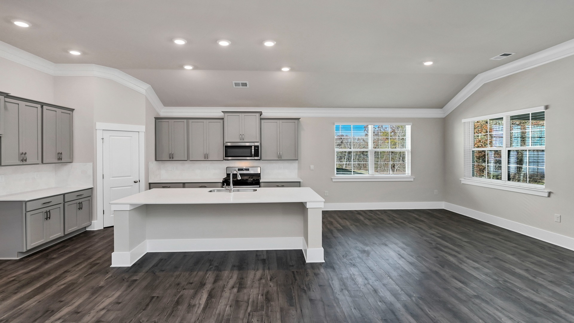 Open concept kitchen and dining areas