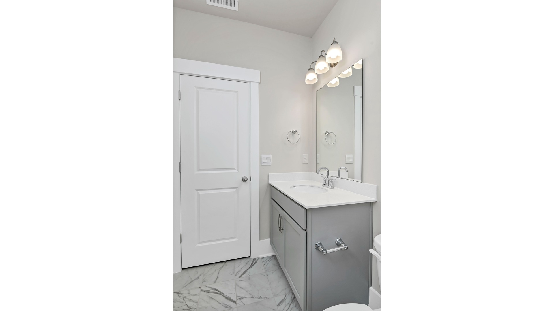 Bathroom 2 with vanity and cabinetry