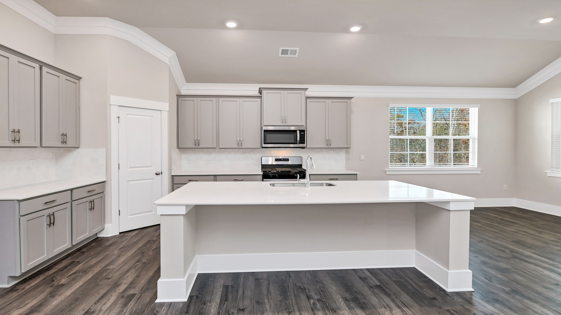 Floating kitchen island with space for barstool seating
