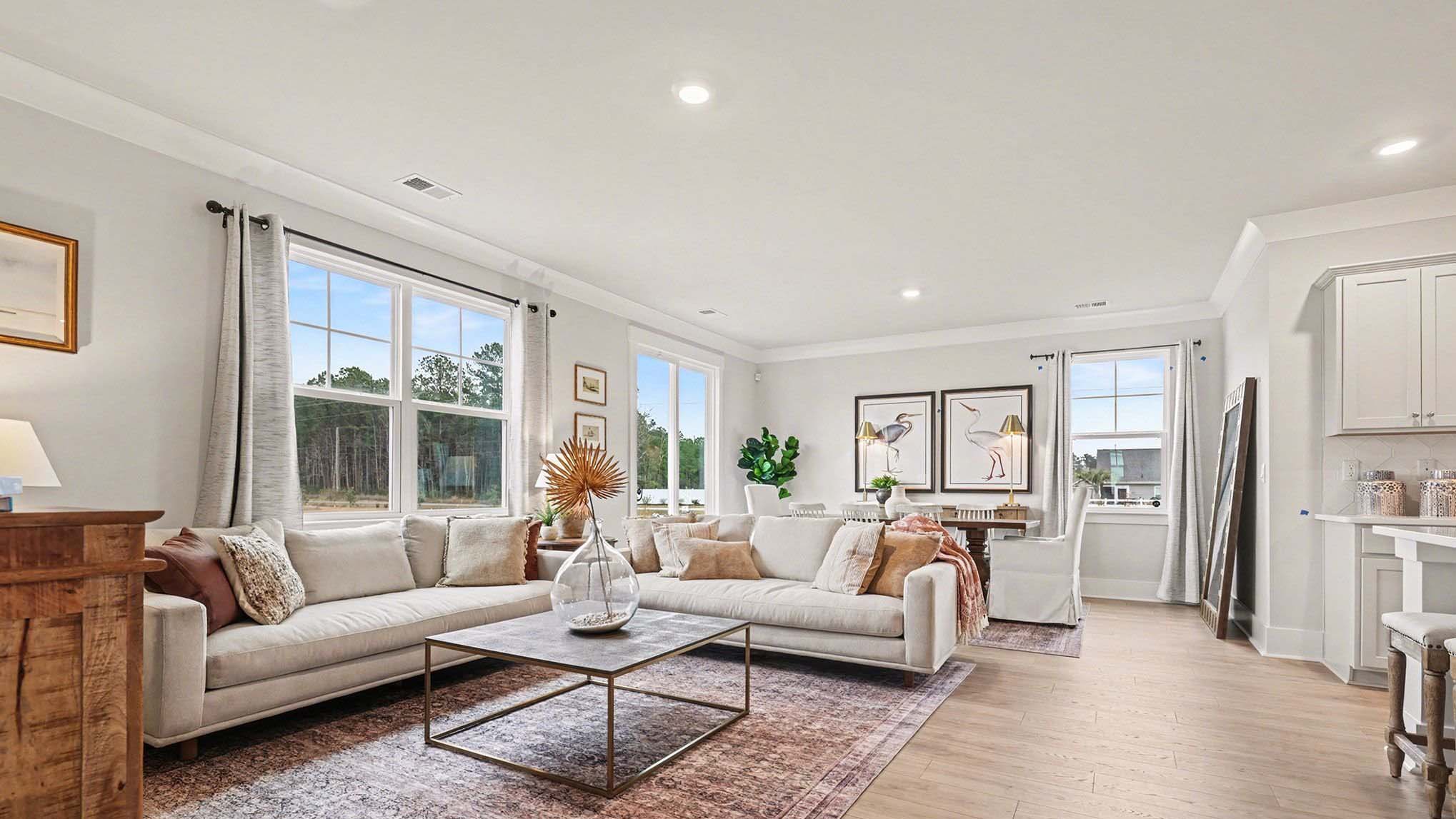 Completely open concept dining and living areas finished the RevWood flooring