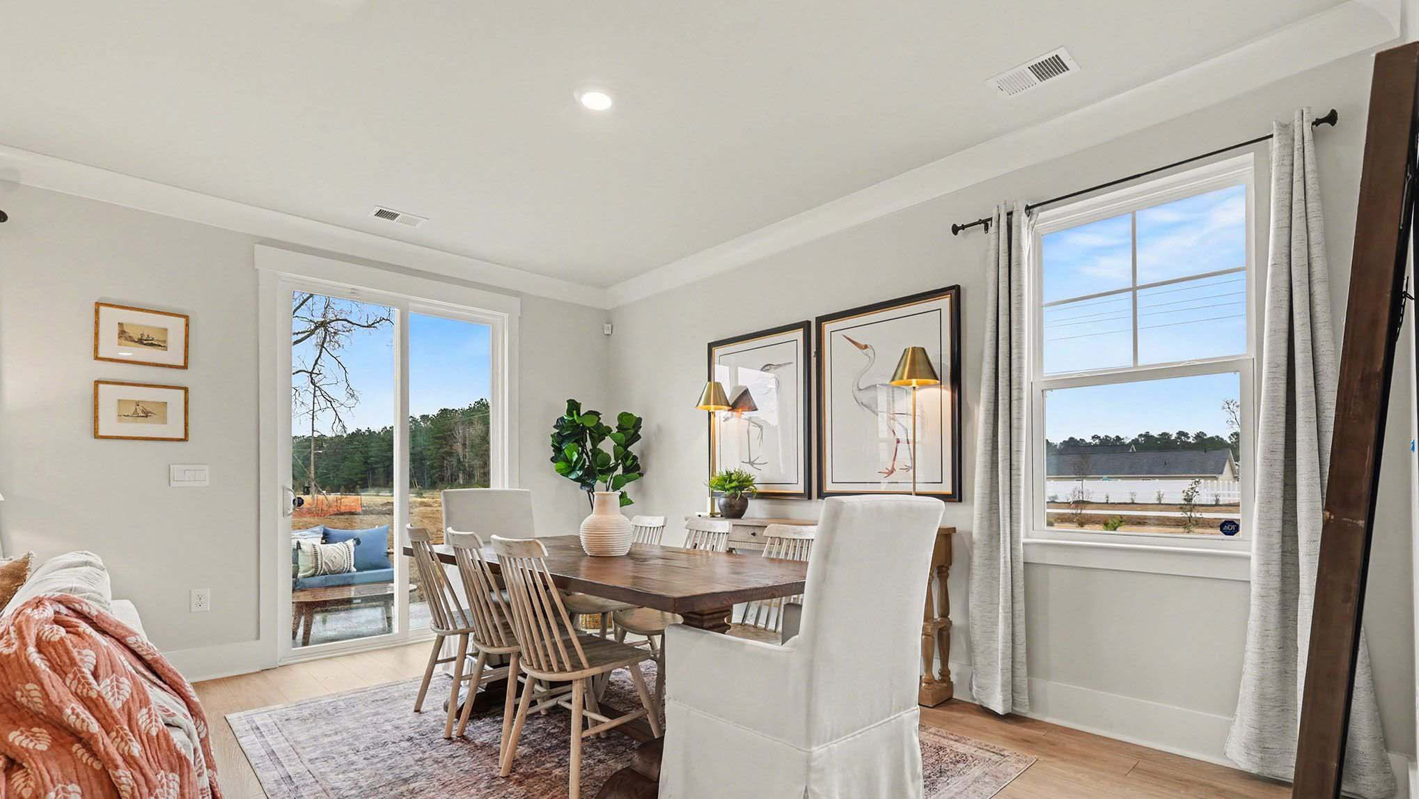 Dining area opens up off the kitchen space with lots of natural light