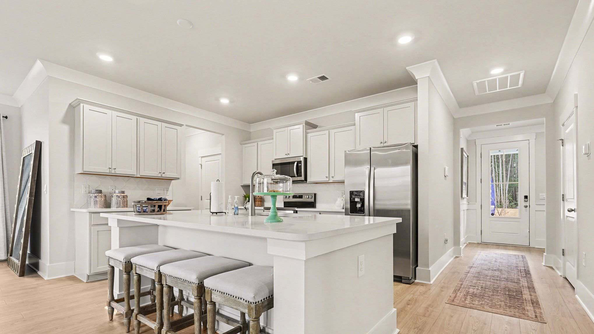 Front foyer opens up into the Belfort kitchen space