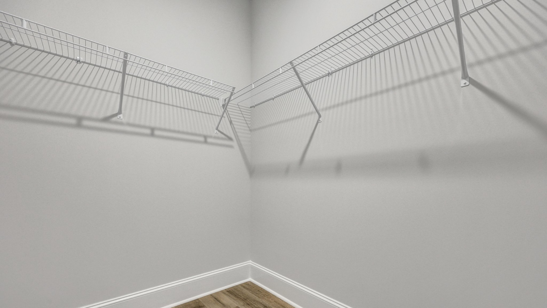 Two walk-in primary closets in home for sale in Chapin