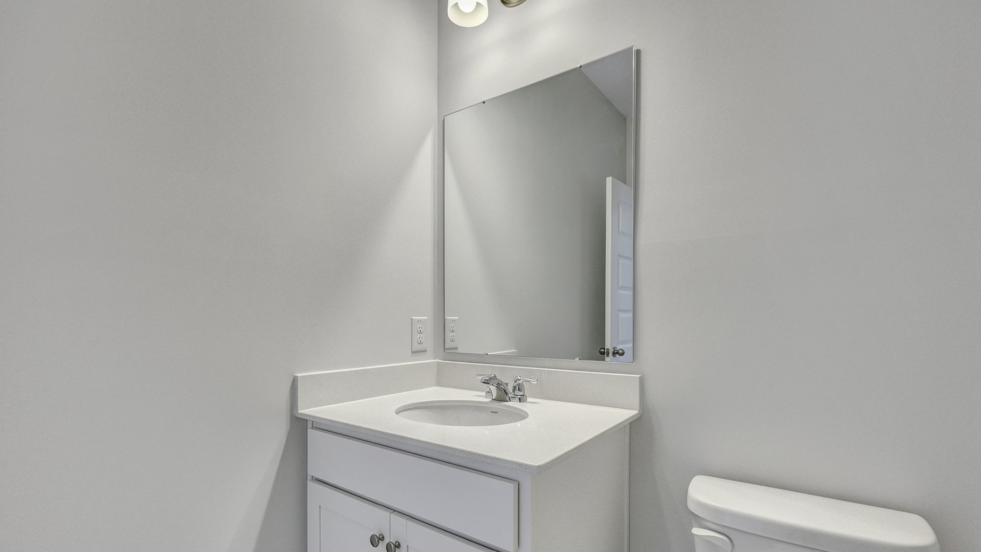 bathroom 2 with quartz countertops on the vanity