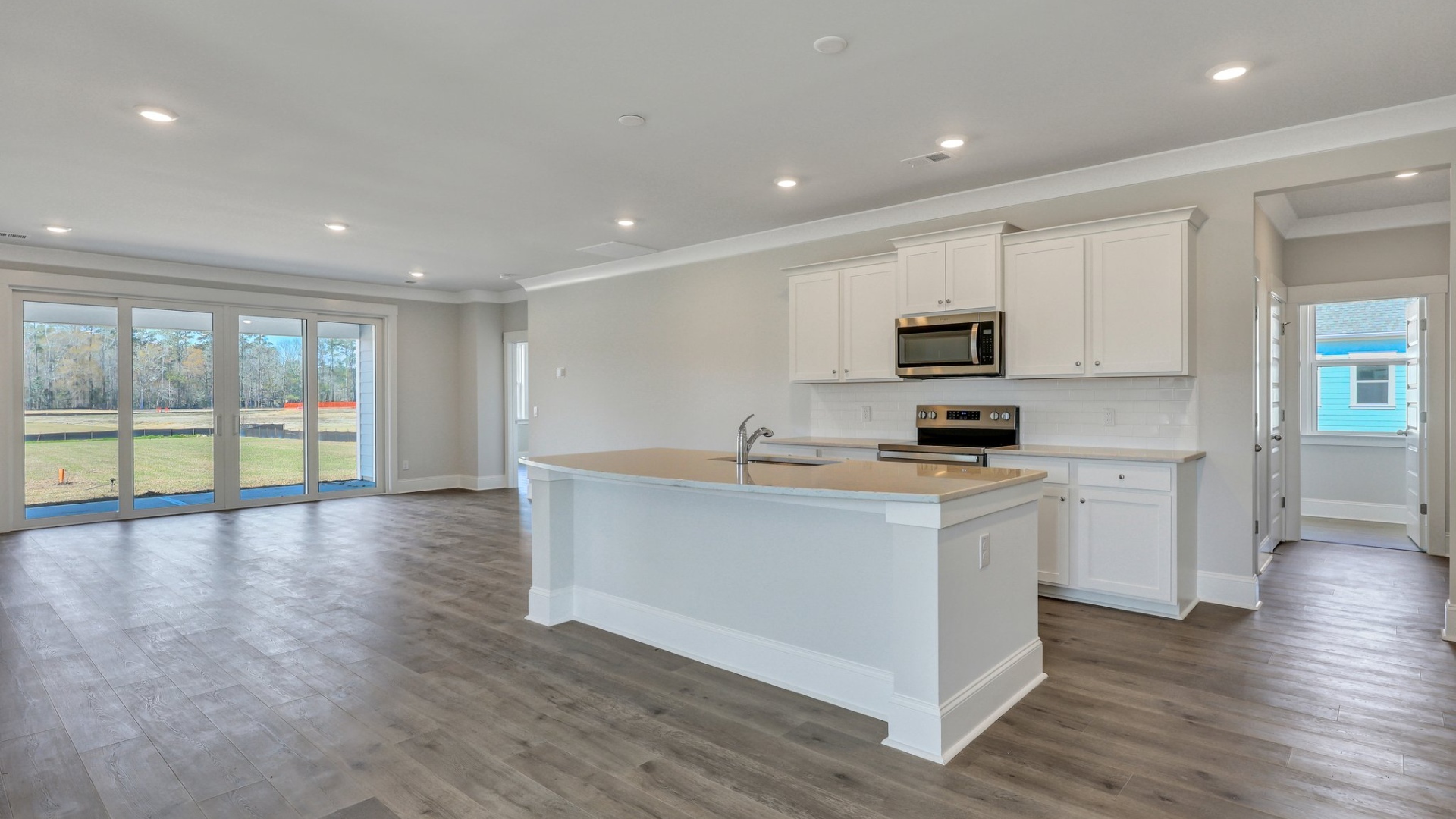 Open Trivecta kitchen space with a floating kitchen island