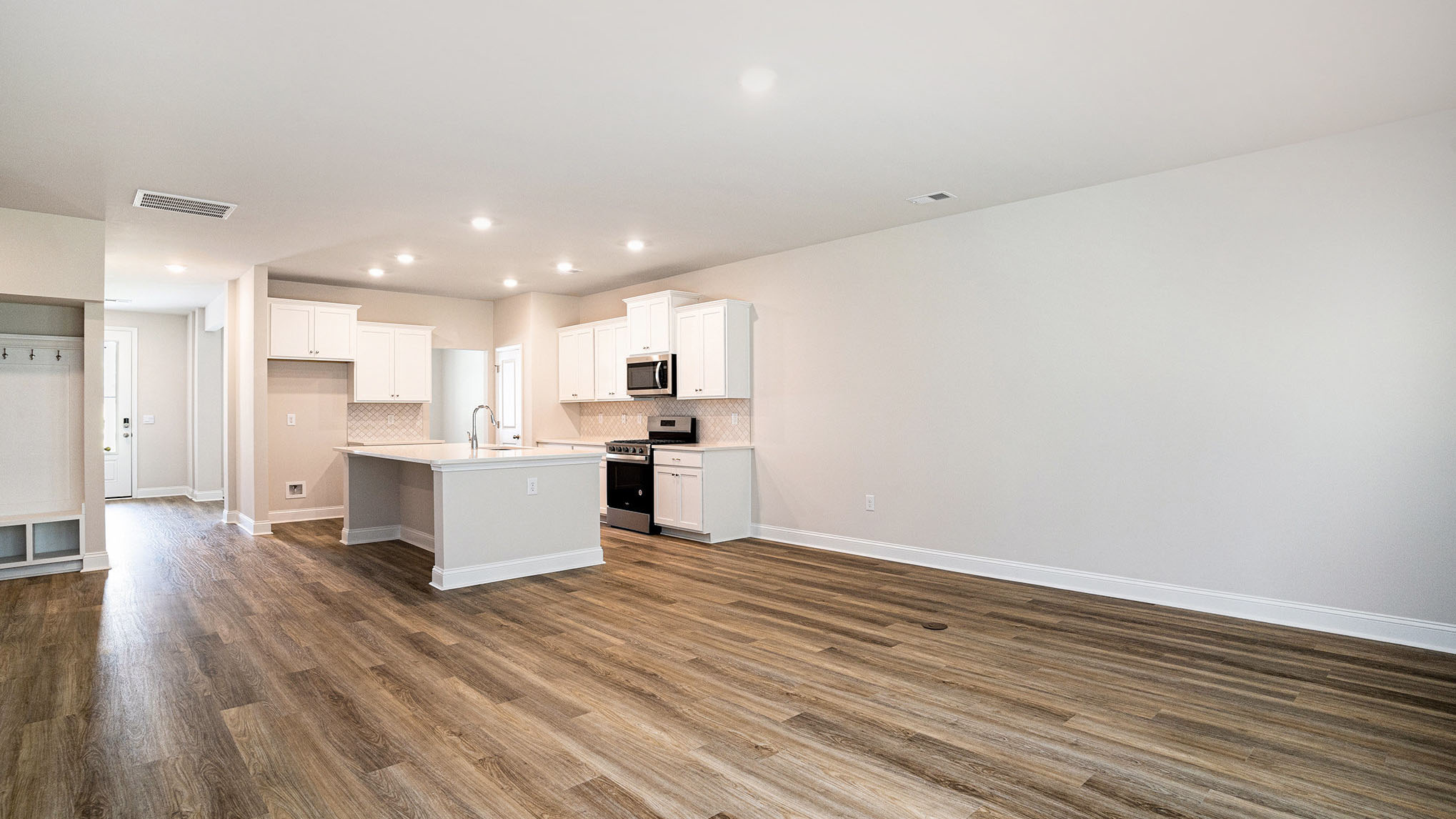 Open concept kitchen and living areas