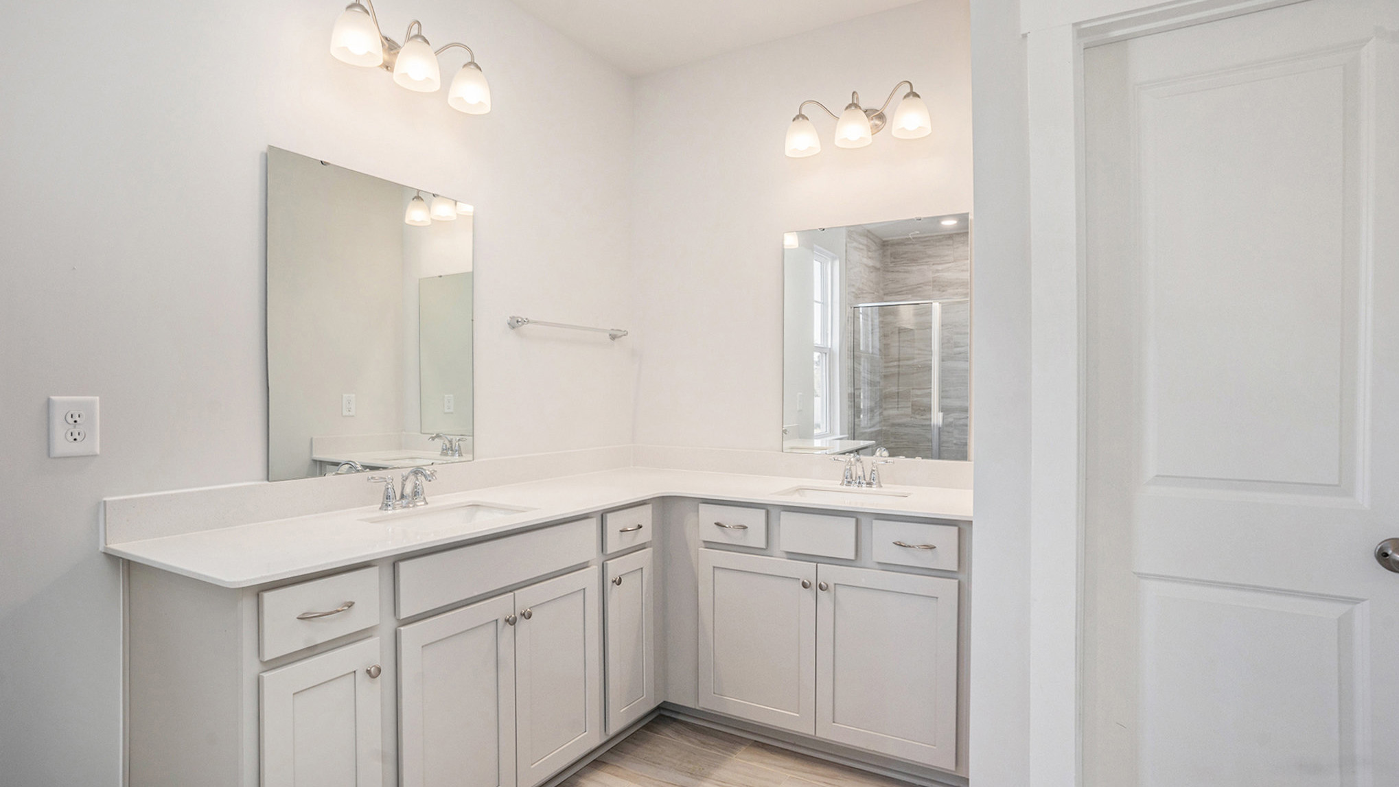 Primary bathroom with two sinks