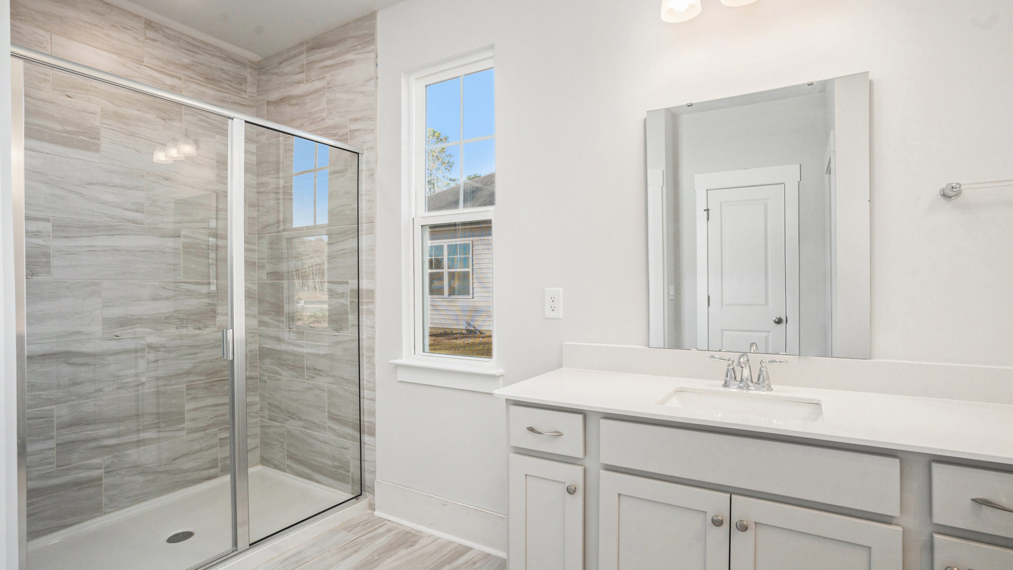 Standup primary shower with glass front