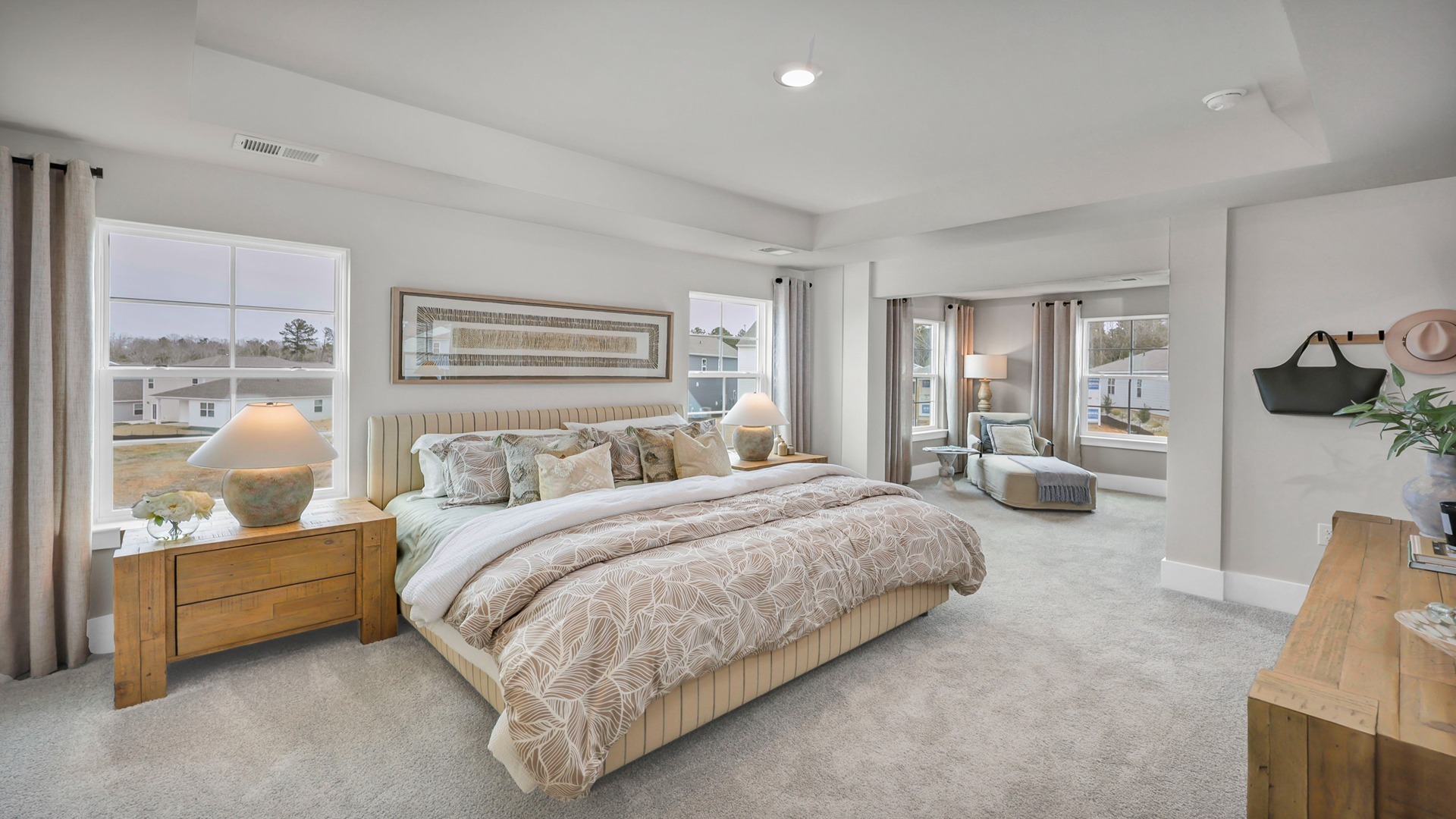 Primary bedroom upstairs with carpet flooring