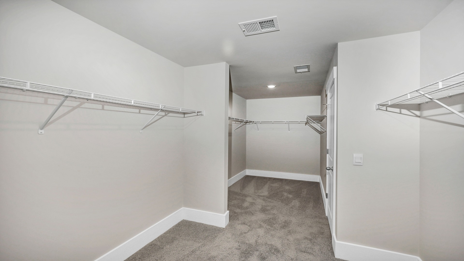 Large, walk-in primary closet