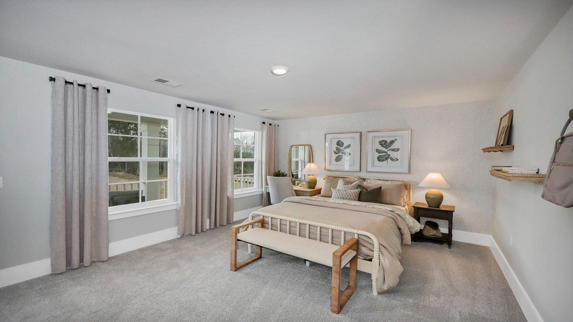 Bedroom 3 with carpet flooring and several windows for light