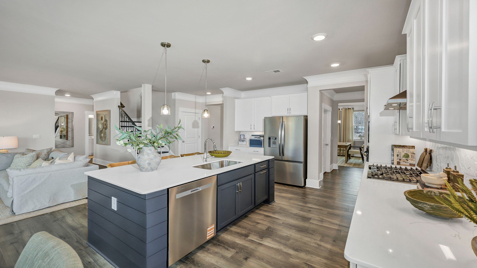 Floating kitchen island overlooks living area